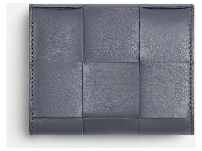 Bottega Veneta Cartera gris con tres pliegues y cremallera alrededor del casete 