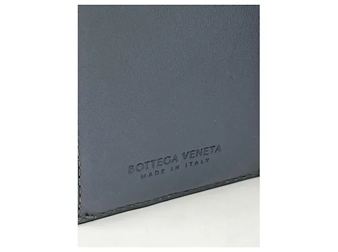 Bottega Veneta Cartera gris con tres pliegues y cremallera alrededor del casete 