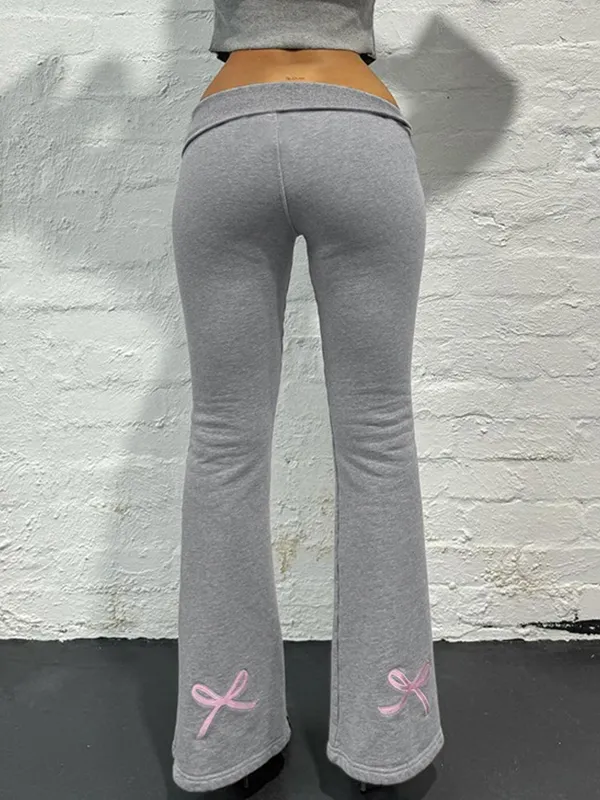 Pantalones acampanados de color liso
