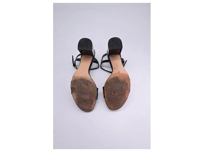 Sandalias de tira en el tobillo Stuart Weitzman en cuero negro brillante 