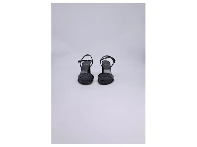 Sandalias de tira en el tobillo Stuart Weitzman en cuero negro brillante 